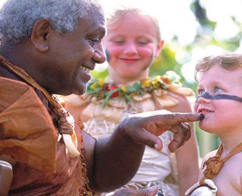 Fijian Family Holiday - Warrior with Boy - Shangri La Fijian Resort