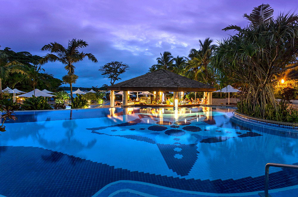 Warwick Le Lagon - Deluxe Vanuatu Resorts - Activity - Main Pool at Sunset