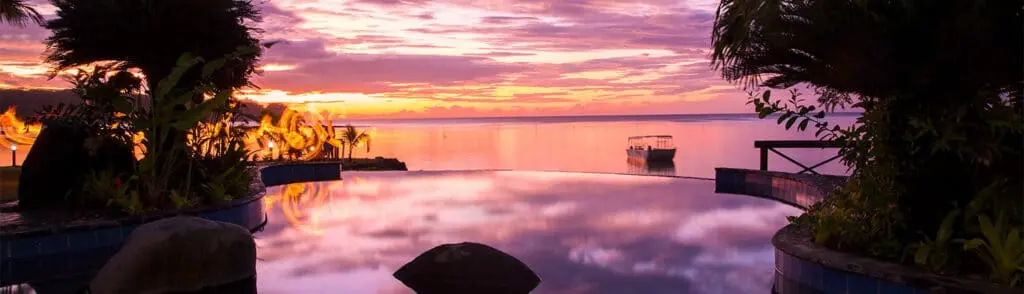 Le Lagato Resort Samoa - Stunning Purple and Red Sunset overlooking the pool