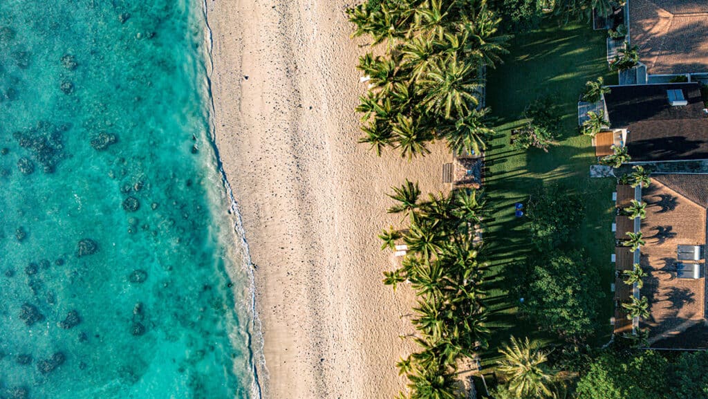 Sunset Resort Cook Islands Drone Sea to Beachfront