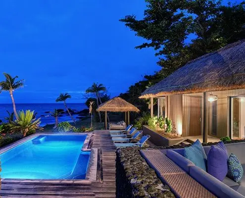 Vomo Island Fiji The Royal night time pool and ocean