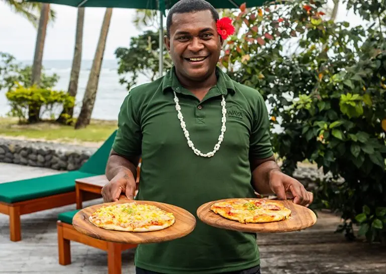 Waya Island Resort Fiji Lui serving pizza