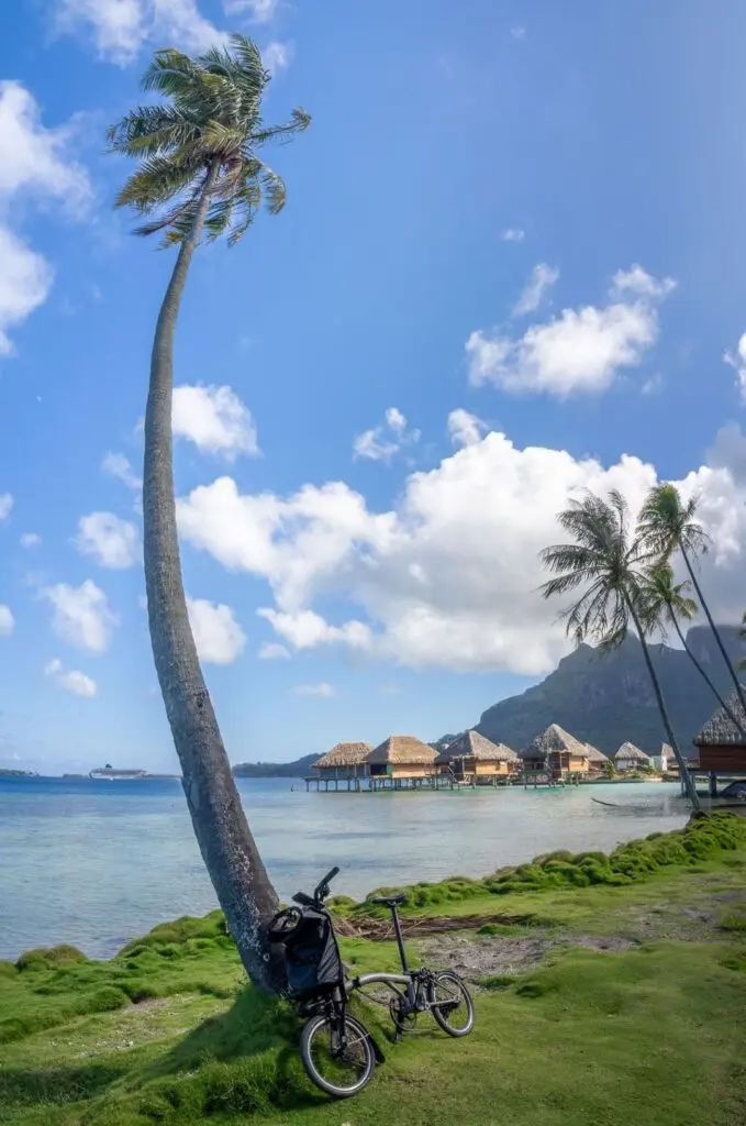Island Escapes Bora Bora Tahiti Holidays Cycling alomh the coastal road of Bora Bora island French Polynesia South Pacific Ocean