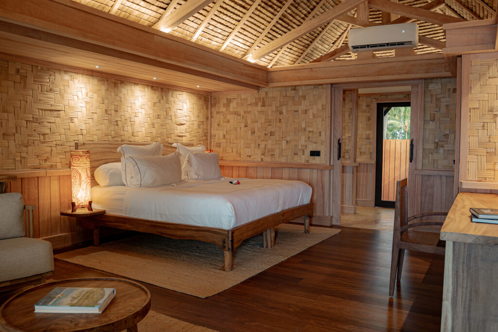 Vahine Private Island Beach Bungalow Stone Wall Bedroom Interior
