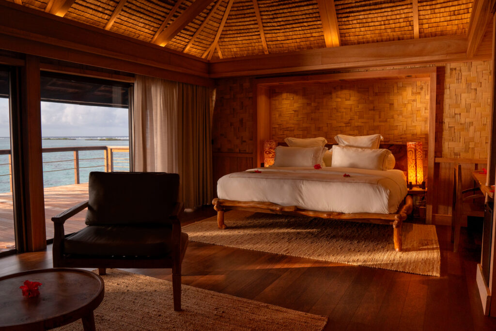 Vahine Private Island Beach Suite Bedroom Interior Warm Light