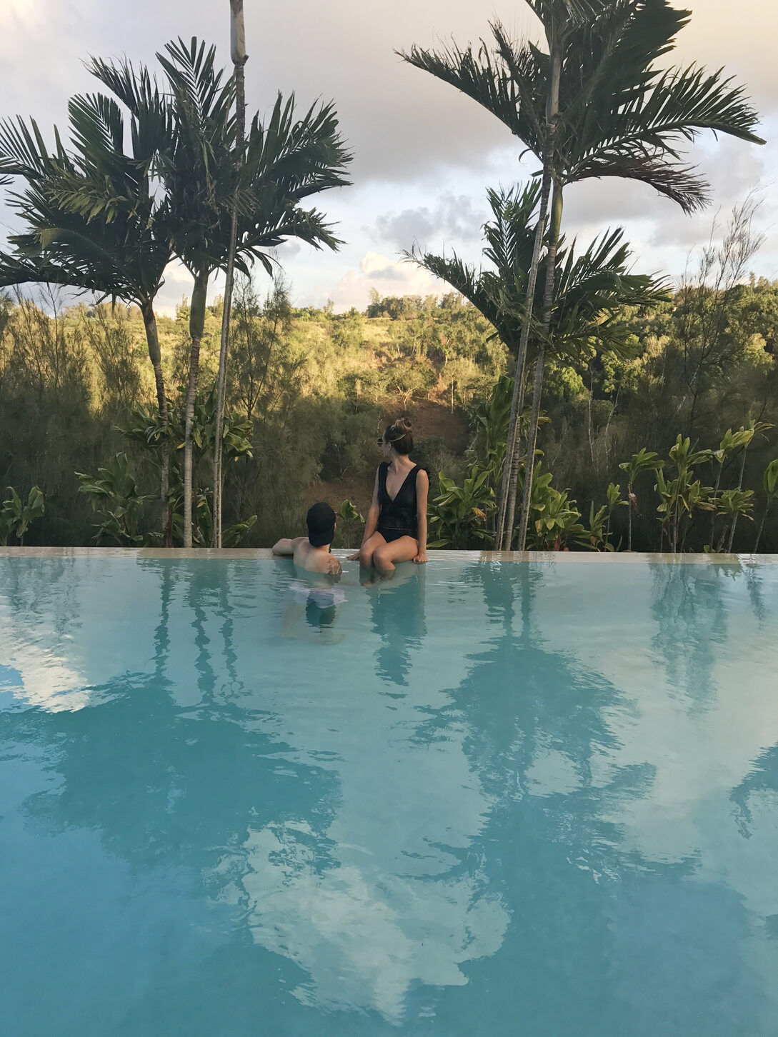 Hawaii Island Big Island of Hawaii couple at a pool at a retreat north kohala ihvb 0384 jpg
