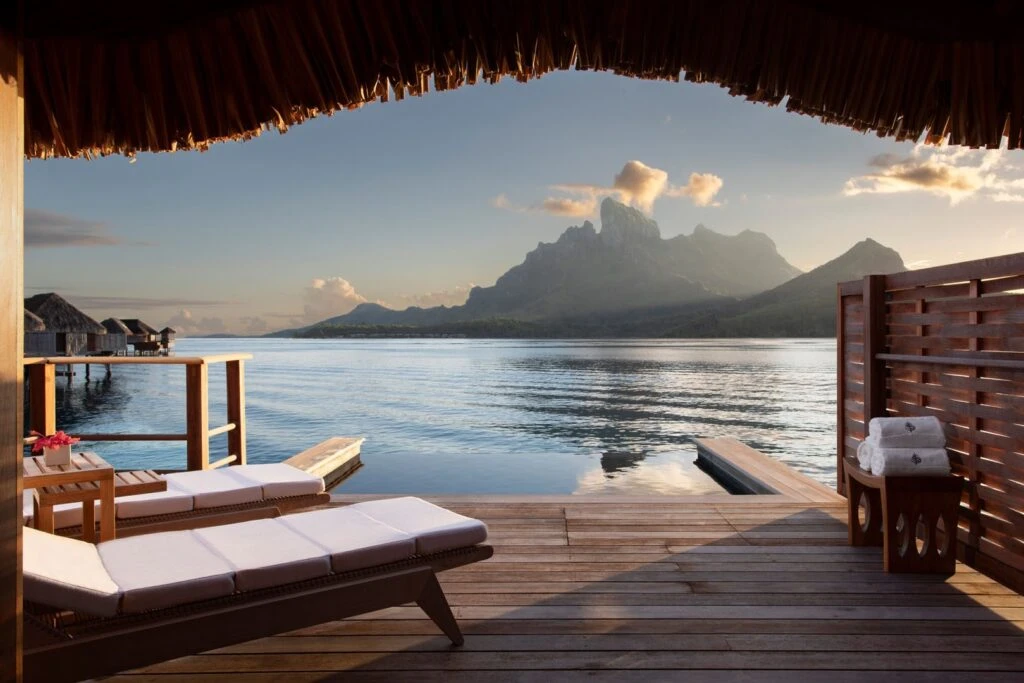 Overwater bungalow deck at Four Seasons Bora Bora looking to Mount Otemanu