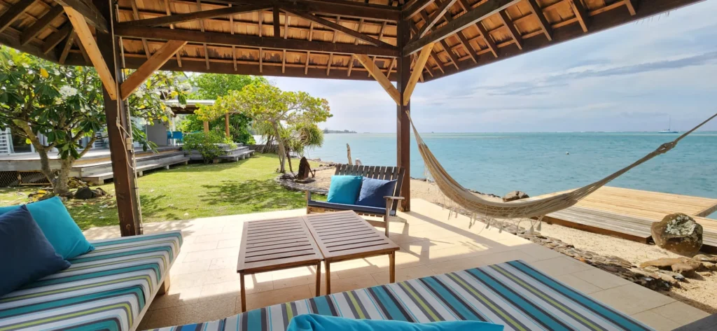 Hammock and daybed in the Fare Pote'e at Villa Vaihau, looking over the lagoon